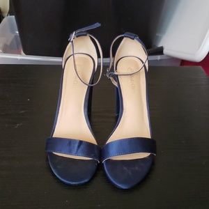 Blue size 9 sandal with heel